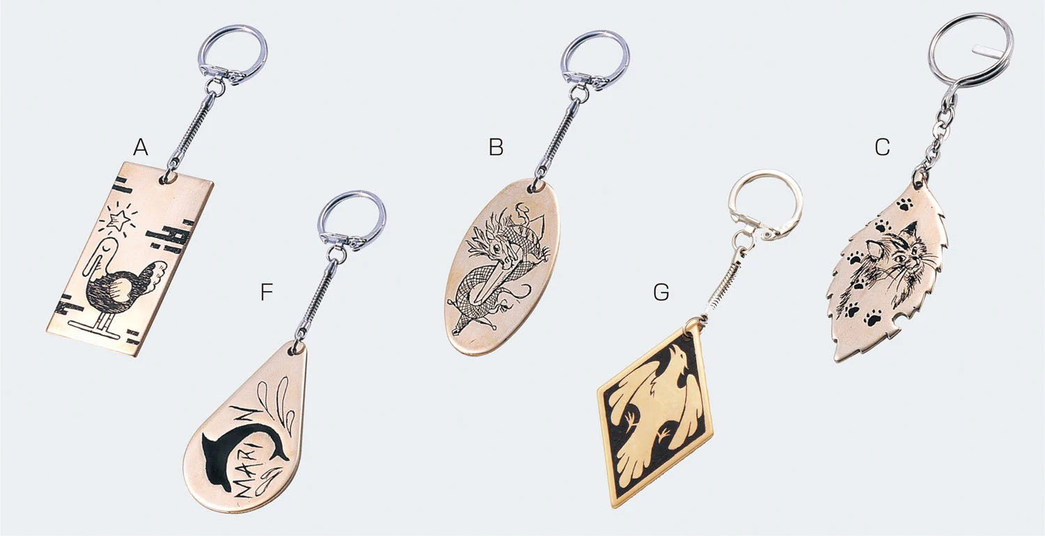 B oval brass key holder