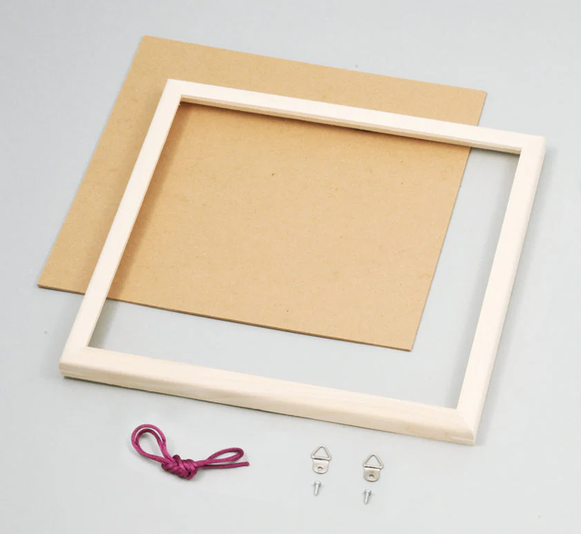 Picture frame for white carved board